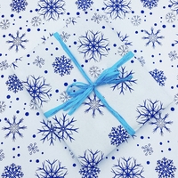 Пакування в подарунковий папір «Сніжинки»