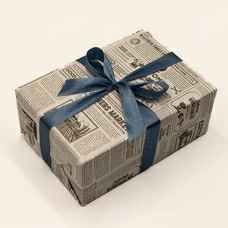 Пакування в подарунковий папір «Newspaper» придбати в інтернет-магазині Супер Пуперс